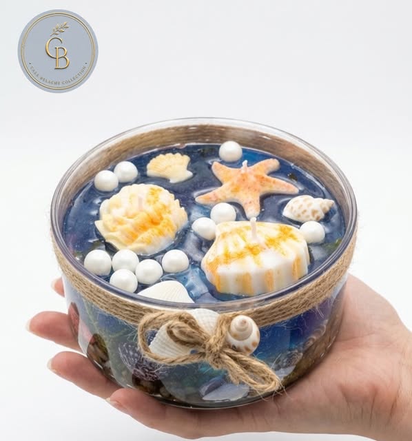 Vela azul com conchas, estrela-do-mar e acabamento em corda